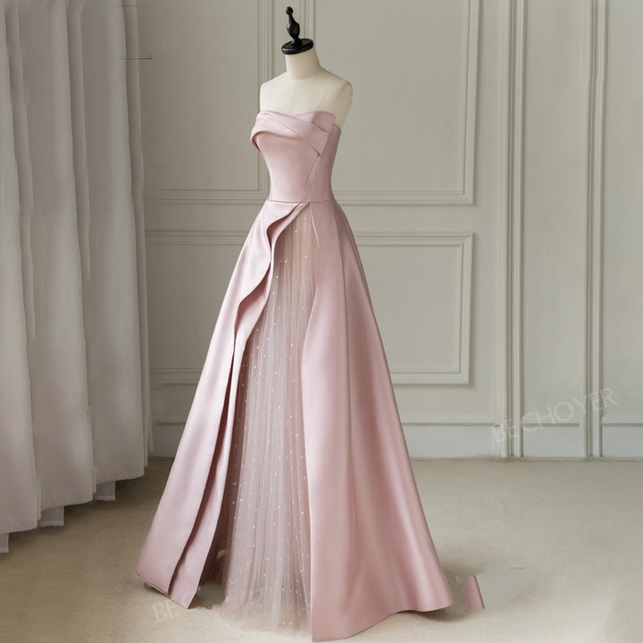 ADELE<br>Sleeveless A-Line Satin Tiered Backless Court Train Bridal Gown