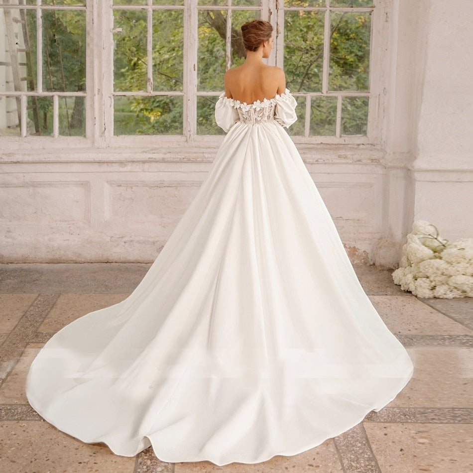 LUCIA<br>A-Line Beaded Flower Appliqué Sweetheart Neckline Satin and Lace Puff Sleeve Bridal Gown
