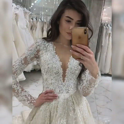 HERALDINE<br>Romantic V-neck Long Sleeve Beaded Lace Wedding Dress with Flower Appliqué