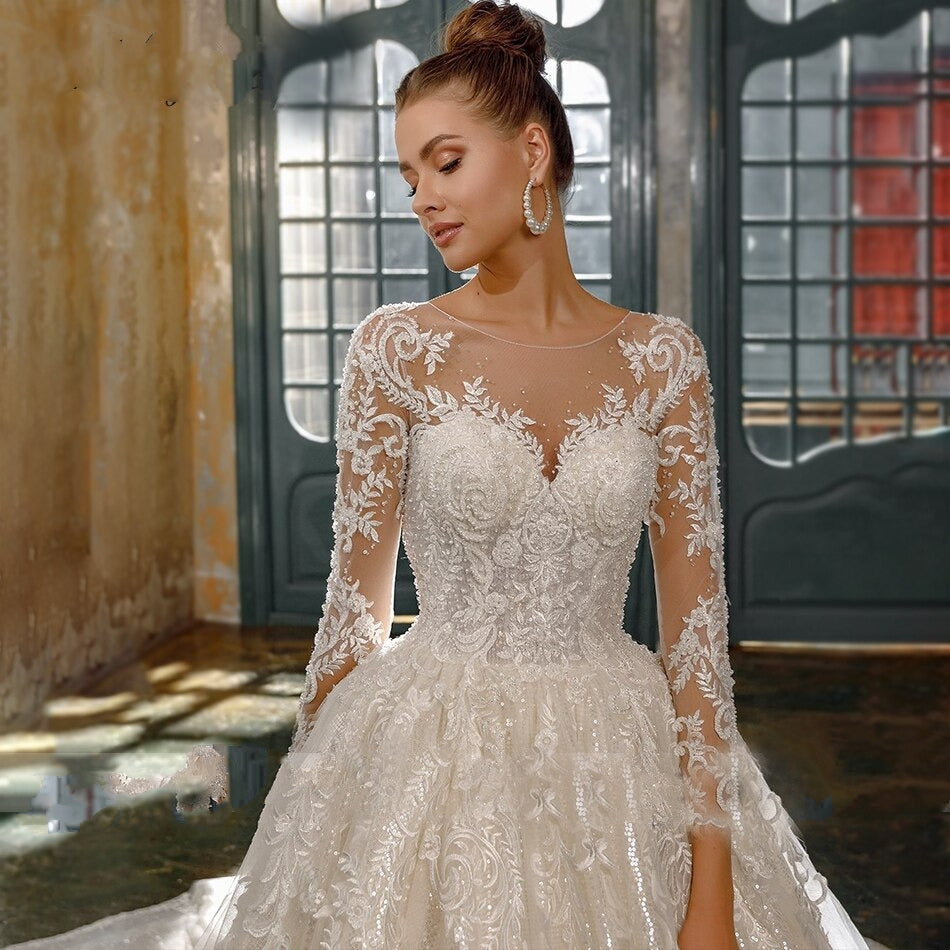 SOPHIA<br>Luxury Long Sleeve Crystal Appliqué Lace Up Cathedral Style Wedding Gown