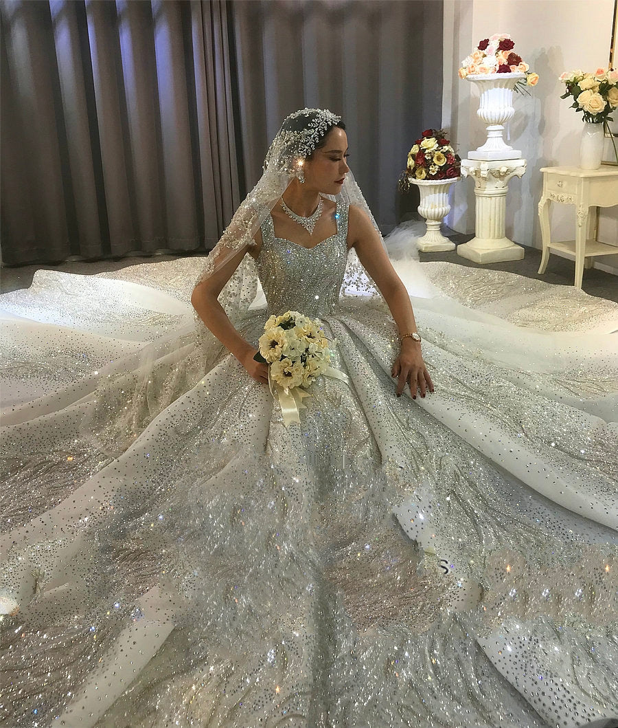 HANNELIOriental Luxury Heavily Beaded Sparkly Train Wedding Gown Marietta la Bella HANNELIOriental Luxury Heavily Beaded Sparkly Train Wedding Gown Marietta la Bella