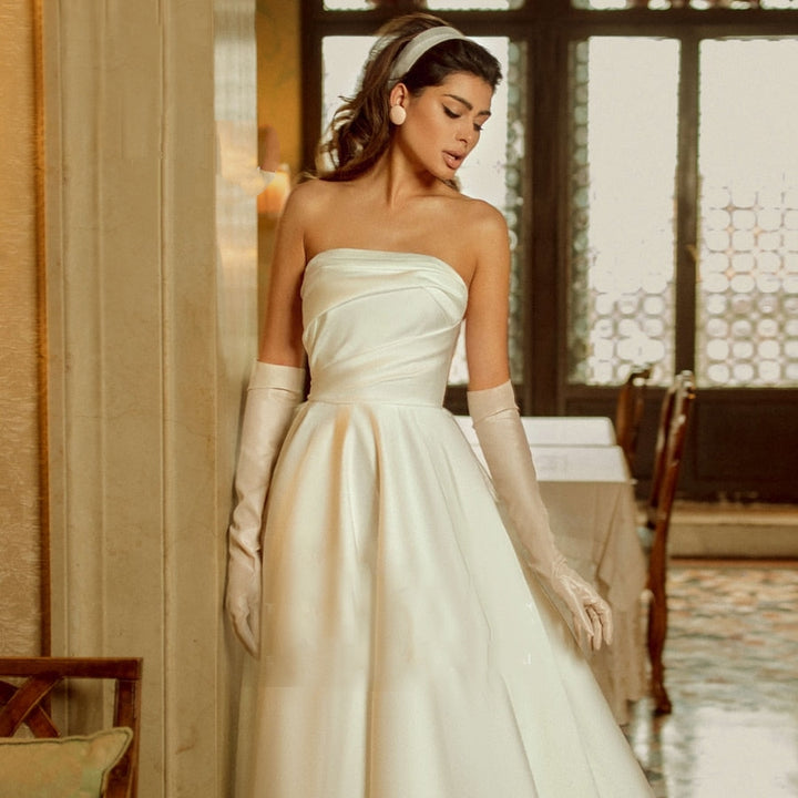 AMARA<br>Satin Vintage Inspired Strapless Backless Midi Bridal Gown With Big Back Bow
