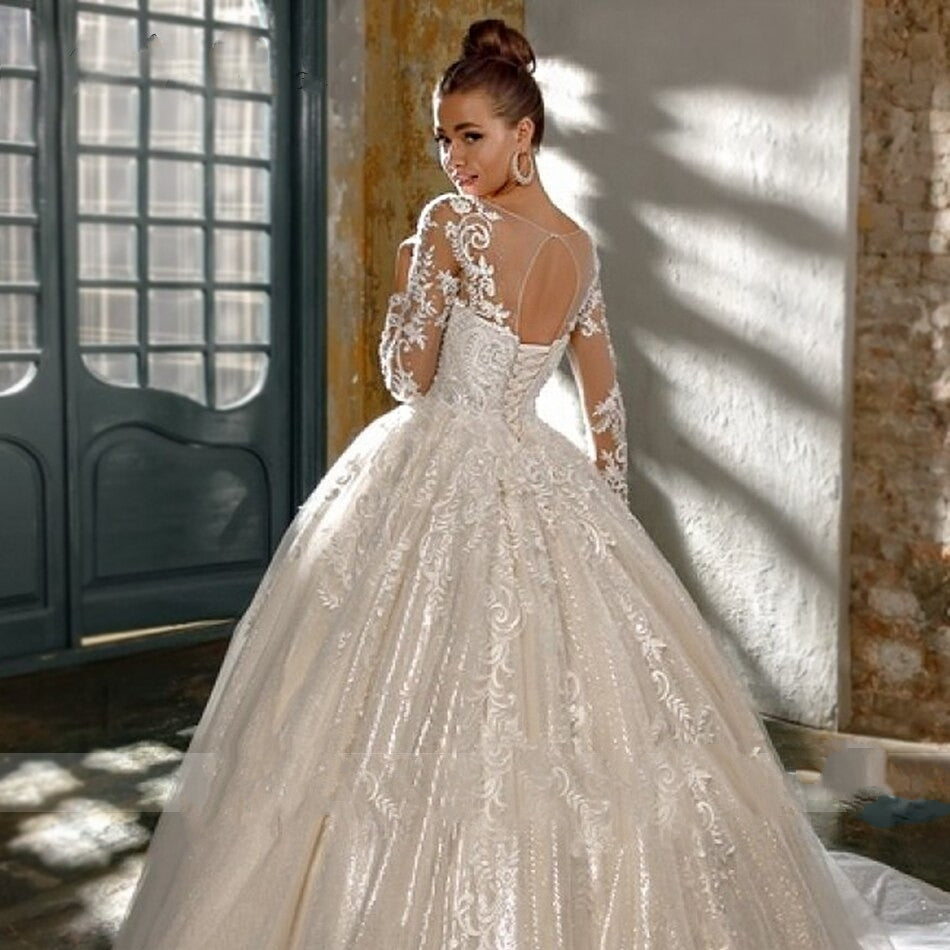 SOPHIA<br>Luxury Long Sleeve Crystal Appliqué Lace Up Cathedral Style Wedding Gown
