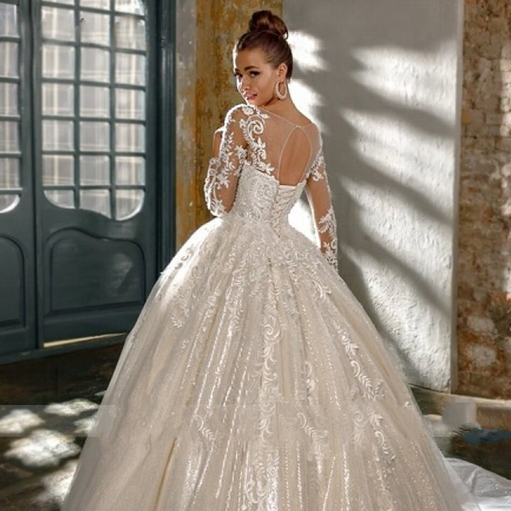 SOPHIA<br>Luxury Long Sleeve Crystal Appliqué Lace Up Cathedral Style Wedding Gown