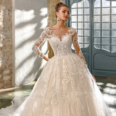 SOPHIA<br>Luxury Long Sleeve Crystal Appliqué Lace Up Cathedral Style Wedding Gown