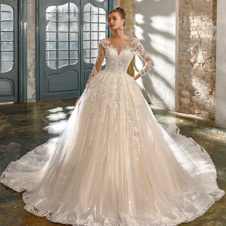 SOPHIA<br>Luxury Long Sleeve Crystal Appliqué Lace Up Cathedral Style Wedding Gown