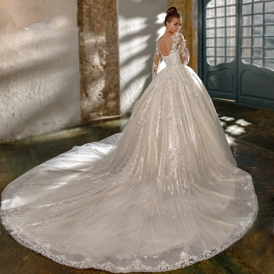 SOPHIA<br>Luxury Long Sleeve Crystal Appliqué Lace Up Cathedral Style Wedding Gown