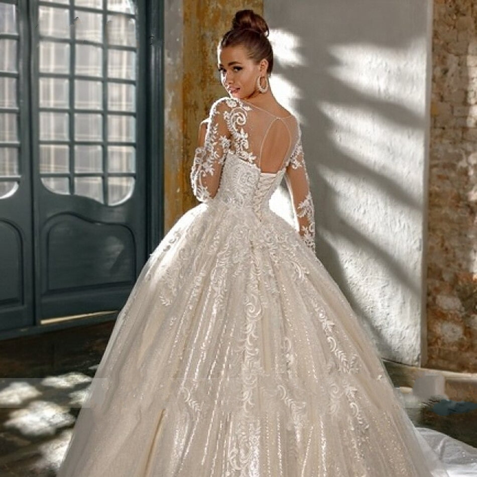 SOPHIA<br>Luxury Long Sleeve Crystal Appliqué Lace Up Cathedral Style Wedding Gown