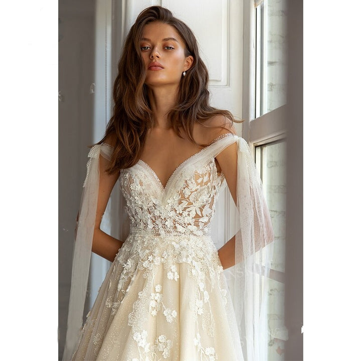 Romantic Sleeveless Appliqué Open Back A-Line Wedding Gown