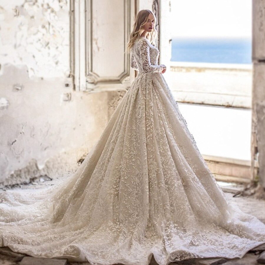 Romantic V-neck Long Sleeve Beaded Lace Wedding Dress with Flowers Appliqué