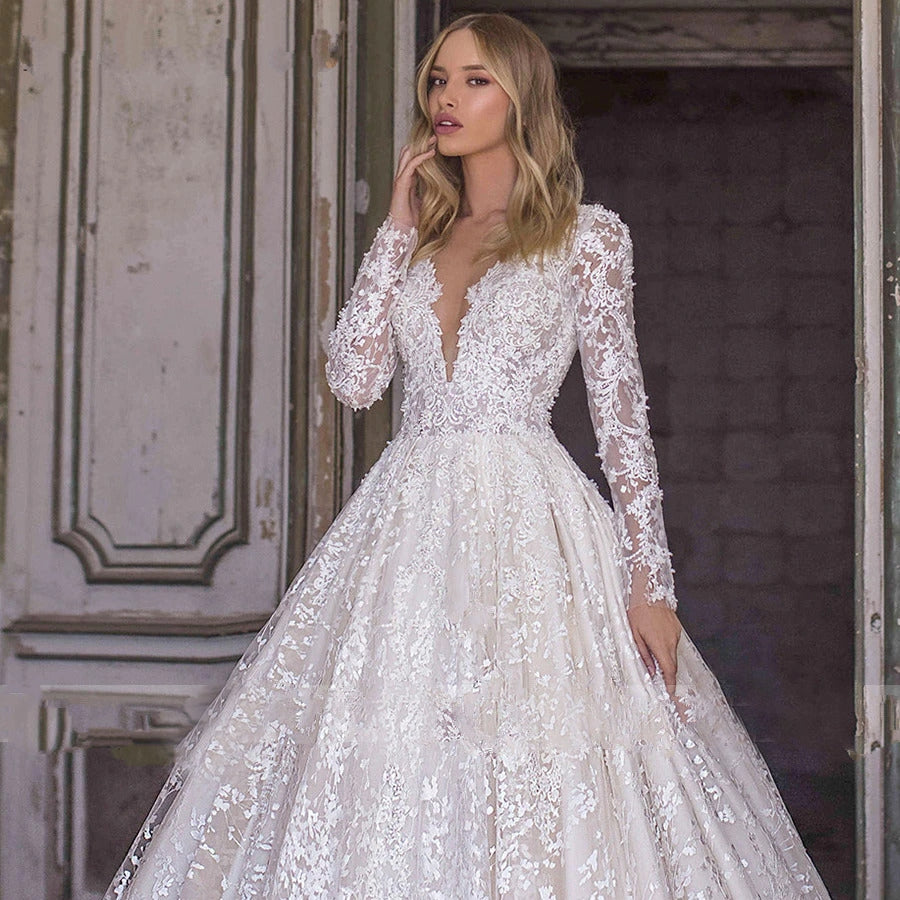 Romantic V-neck Long Sleeve Beaded Lace Wedding Dress with Flowers Appliqué