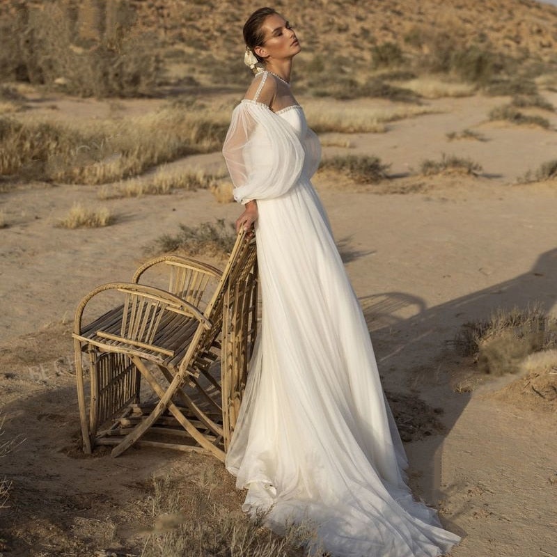 IZOLTE<br>Beaded Illusion Long Sleeve A-Line Boho Style Crystal Belt Court Train Wedding Dress