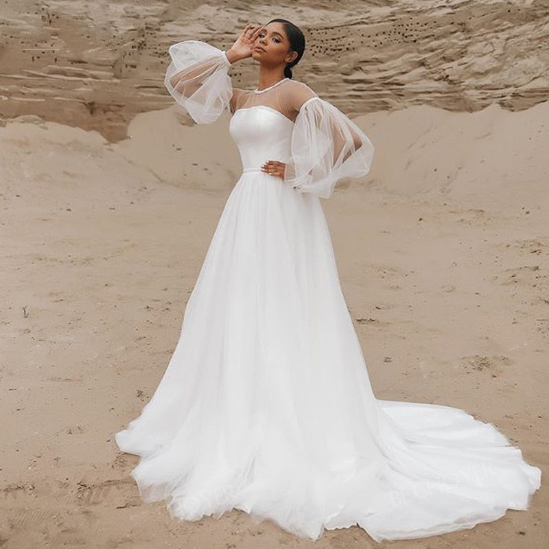IZOLTE<br>Beaded Illusion Long Sleeve A-Line Boho Style Crystal Belt Court Train Wedding Dress