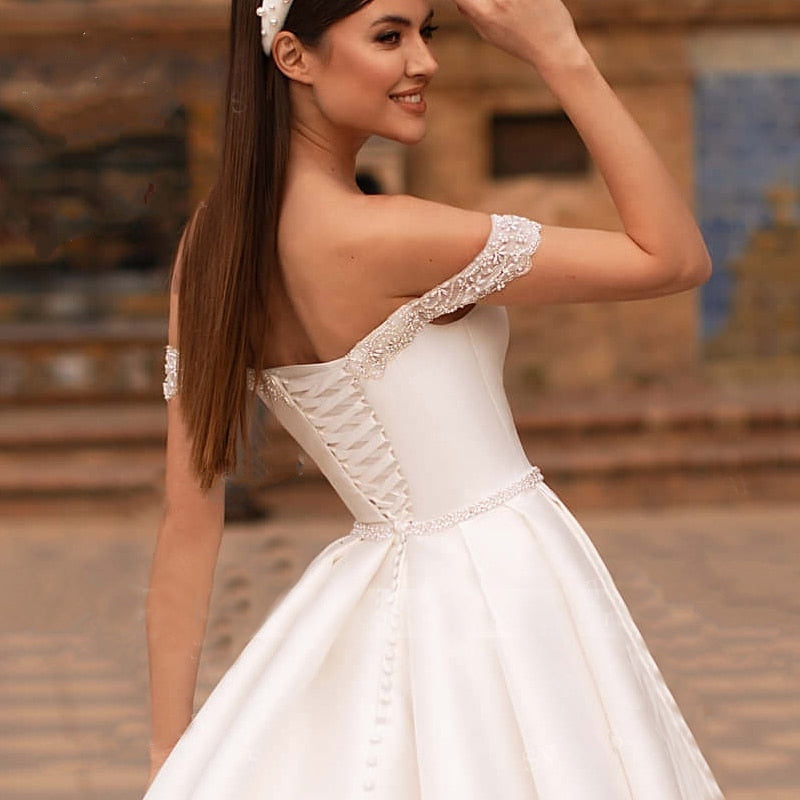 OLIVIA<br>Beaded Satin A-Line Sweetheart Neckline Sleeveless Crystal Belt Bridal Gown