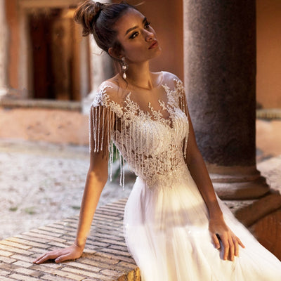 PENELOPE<br>Tasseled Beaded Appliqué Lace Scoop Neckline A-Line Tulle Illusion Bridal Gown