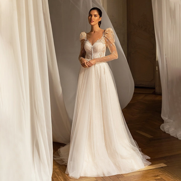 ROMINA<br>A-Line Delicate Beaded Sequined Lace Sweetheart Neckline Long Sleeves Backless Bridal Gown