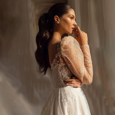 ROMINA<br>A-Line Delicate Beaded Sequined Lace Sweetheart Neckline Long Sleeves Backless Bridal Gown