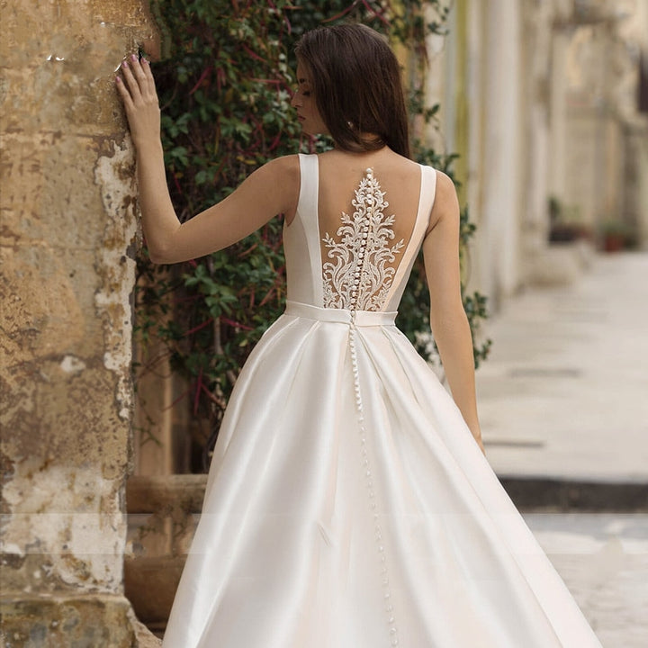 ROWENA<br>Elegant Scoop Neck Beaded Appliqué Button-up Satin Bridal Gown