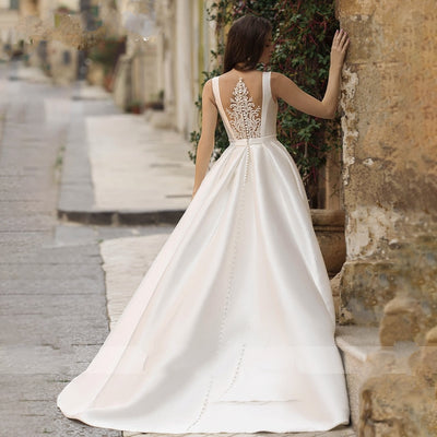 ROWENA<br>Elegant Scoop Neck Beaded Appliqué Button-up Satin Bridal Gown