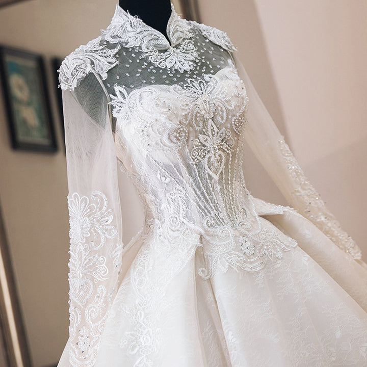 NURA<br>Oriental Luxury Beaded Appliqué Long Sleeve High Neck Ball Gown Wedding Dress