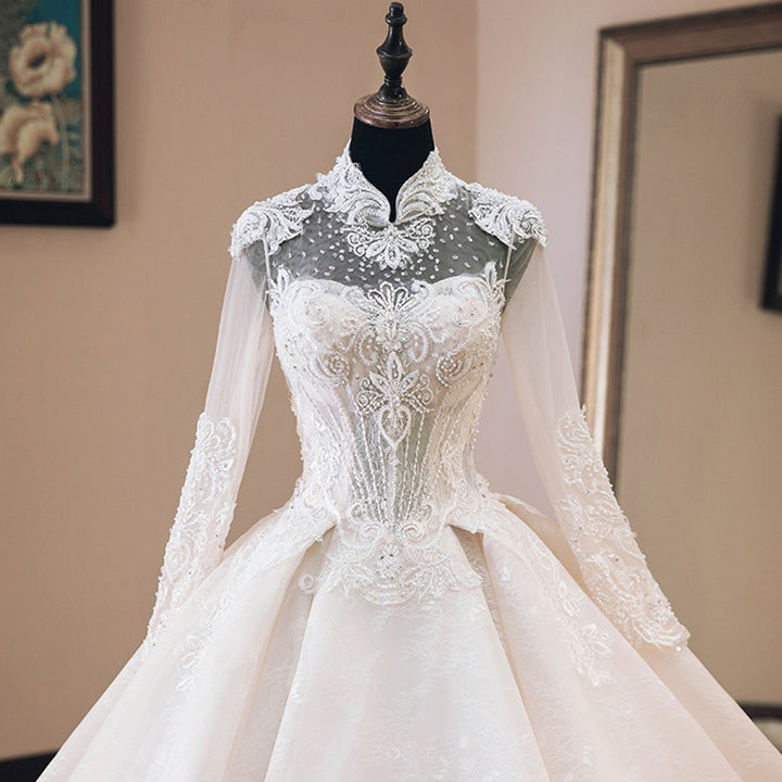 NURA<br>Oriental Luxury Beaded Appliqué Long Sleeve High Neck Ball Gown Wedding Dress