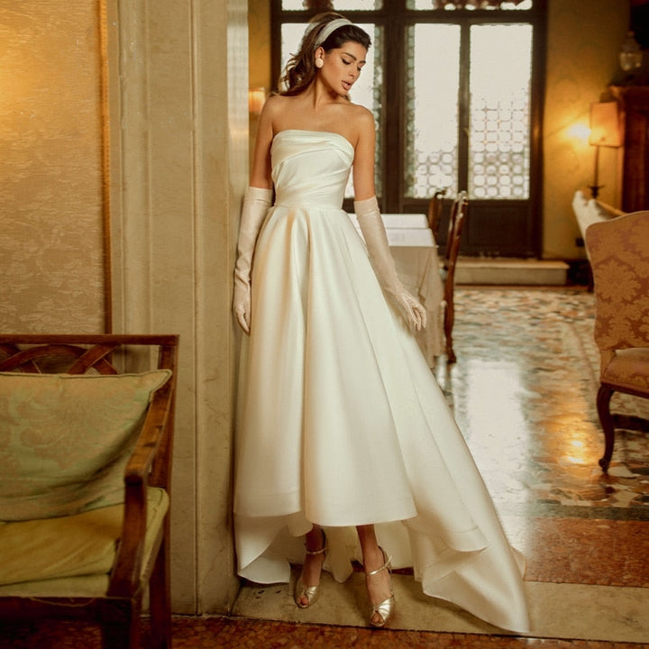 AMARA<br>Satin Vintage Inspired Strapless Backless Midi Bridal Gown With Big Back Bow